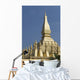 Architectural detail of a golden rooftop Wall Mural