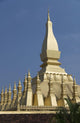 Architectural detail of a golden rooftop Wall Mural