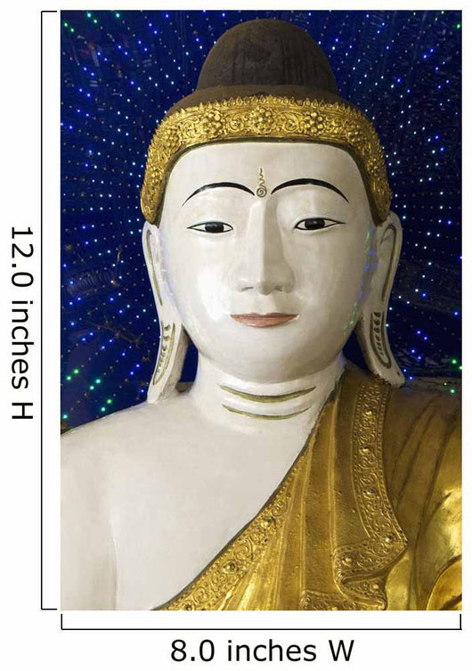 Head of a Buddha statue against blue background Wall Mural