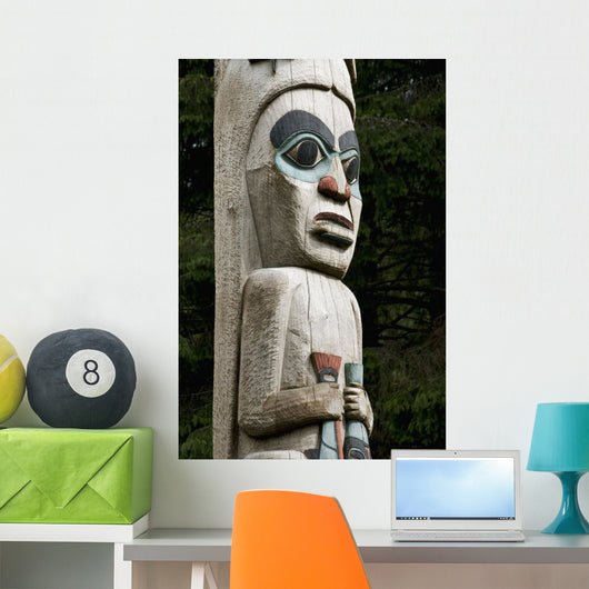 carvings on totem pole Wall Mural