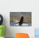 Propelling its body from the ocean Wall Mural