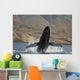 Propelling its body from the ocean Wall Mural