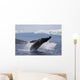 Propelling its body from the ocean Wall Mural