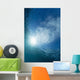 Sunlight streaming through the surface of the Pacific Ocean Wall Mural