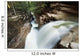 A forest waterfall Wall Mural