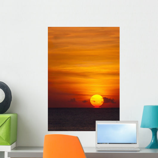Indonesia, Bali, A fiery sunset over open waters Wall Mural