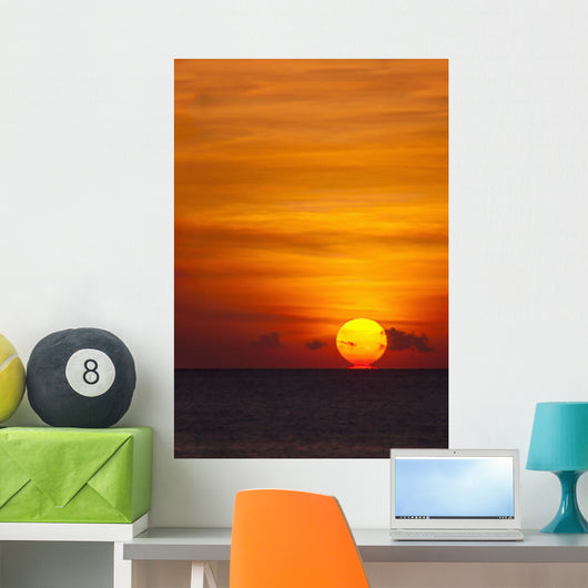 Indonesia, Bali, A fiery sunset over open waters Wall Mural
