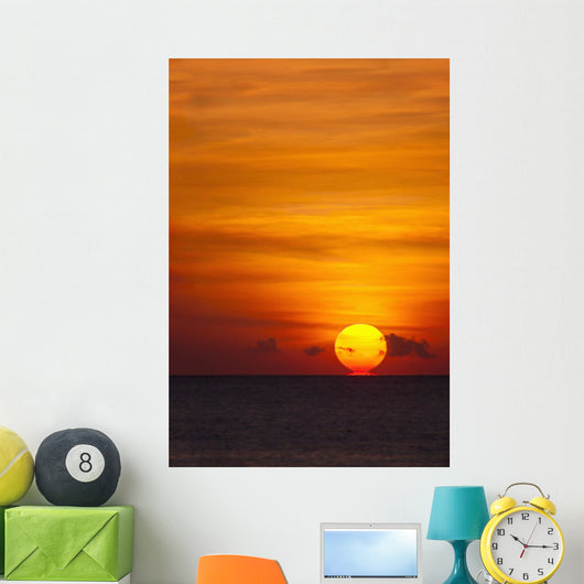 Indonesia, Bali, A fiery sunset over open waters Wall Mural