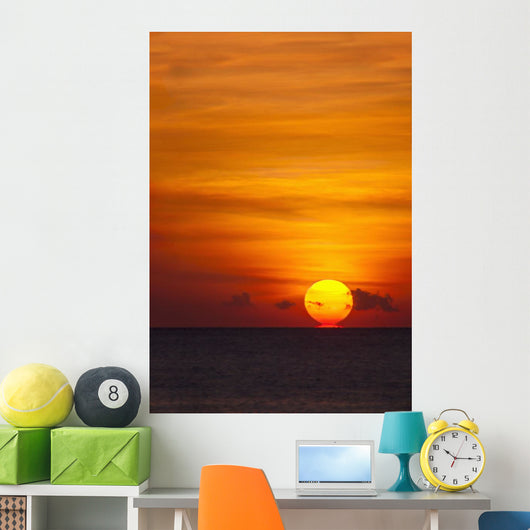 Indonesia, Bali, A fiery sunset over open waters Wall Mural