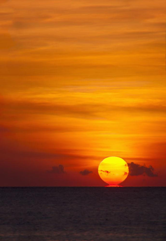 Indonesia, Bali, A fiery sunset over open waters Wall Mural