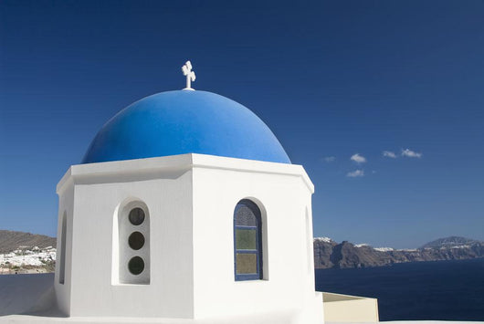 Island of Thirassia in the distance Wall Mural