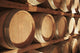 Wine Barrels Stacked On Shelves Wall Mural