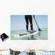 Paddling on a surfboard;Tarifa cadiz andalusia spain Wall Mural