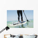 Paddling on a surfboard;Tarifa cadiz andalusia spain Wall Mural
