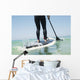 Paddling on a surfboard;Tarifa cadiz andalusia spain Wall Mural
