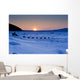 Dallas Seavey Drops Down The Bank Onto The Yukon River Wall Mural