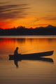 Man Canoeing @ Sunset In Lake Southcentral Ak Wall Mural
