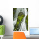 Waterfall Flows Over Green Foliage And Rock Outcrop Wall Mural