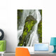 Waterfall Flows Over Green Foliage And Rock Outcrop Wall Mural