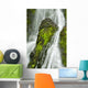 Waterfall Flows Over Green Foliage And Rock Outcrop Wall Mural
