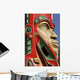 Close Up Of A Face On A Traditional Haida Totem Carving In Ketchikan Wall Mural