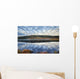 A Pattern Of Clouds Are Reflected Wall Mural
