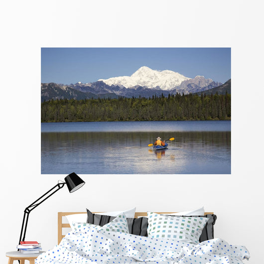 Man Paddling A Klepper Kayak Wall Mural