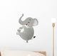 Stong tinny ant lifting a giant elephant Wall Decal