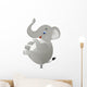 Stong tinny ant lifting a giant elephant Wall Decal