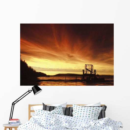 A Fish Wheel Spins During An Early Morning Sunrise On The Tanana River Wall Mural