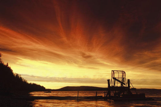 A Fish Wheel Spins During An Early Morning Sunrise On The Tanana River Wall Mural