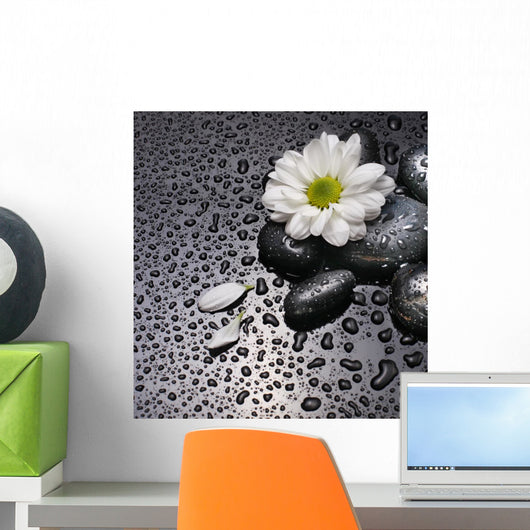 black stones and white flower Wall Mural