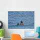 Sea Otters Swimming Wall Mural