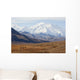 Three Caribou Run Thru The Tundra With Mt Mckinley Looming Wall Mural