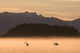 Kayakers Paddling Through The Misty Waters Of Favorite Passage, Wall Mural