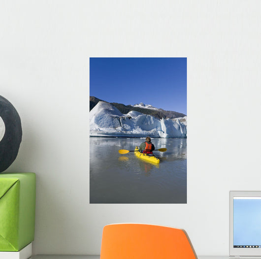 A Kayaker Paddles The Icy Waters Of Mendenhall Lake Wall Mural