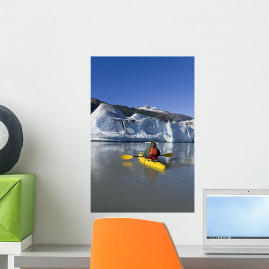 A Kayaker Paddles The Icy Waters Of Mendenhall Lake Wall Mural