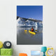 A Kayaker Paddles The Icy Waters Of Mendenhall Lake Wall Mural
