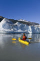 A Kayaker Paddles The Icy Waters Of Mendenhall Lake Wall Mural