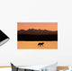 Silhouette Of A Wolf Walking At Sunset Wall Mural