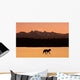 Silhouette Of A Wolf Walking At Sunset Wall Mural
