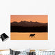 Silhouette Of A Wolf Walking At Sunset Wall Mural