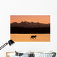 Silhouette Of A Wolf Walking At Sunset Wall Mural