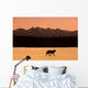 Silhouette Of A Wolf Walking At Sunset Wall Mural