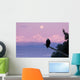 A Bald Eagle Perched On A Branch With The Moon Set At Sunrise Wall Mural