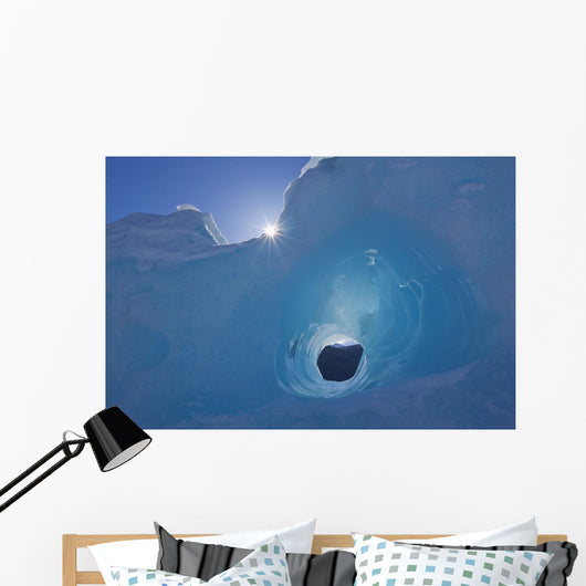 Small Tunnel Eroded In An Iceberg Frozen In Mendenhall Lake Wall Mural