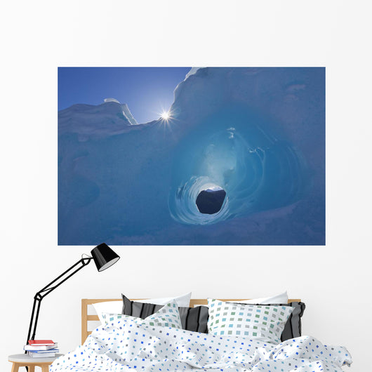 Small Tunnel Eroded In An Iceberg Frozen In Mendenhall Lake Wall Mural