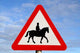 accompanied horses or ponies, warning road sign. Wall Mural