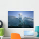An Iceberg Floating On The Calm Waters Of Holkham Bay Wall Mural