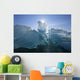 An Iceberg Floating On The Calm Waters Of Holkham Bay Wall Mural
